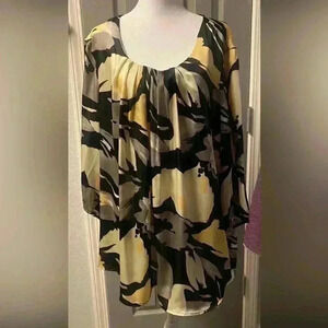 Covington Woman floral design with scooped neckline & pleats 3/4 sleeves